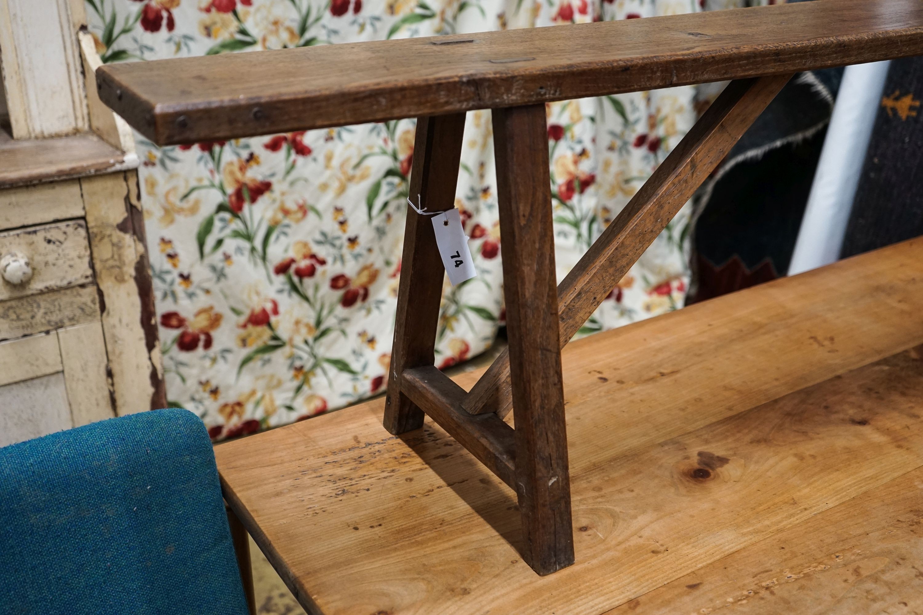 A 19th century French provincial oak bench seat, length 194cm, depth 30cm, height 42cm
